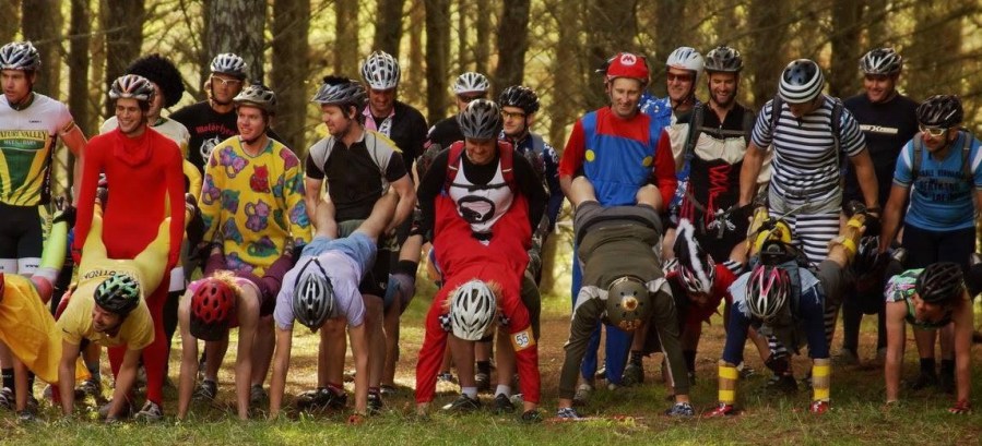 Riders lined up for a wheelbarrow race at the start of Single Speed Sundays 2013